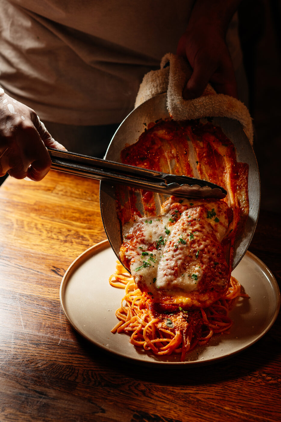 Italian restaurant near Ramsey, NJ — chicken parmigiana over spaghetti at Nonna's Pizza & Bar